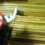 A motherboard standoff mounted on the Vizo Voyager II hard disk cooler.