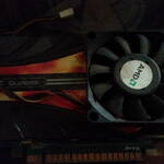 A computer graphic card with an AMD CPU cooler fan mounted on to replace the dead fan.