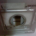 Bottom view of hard disk cage with the slats bended.