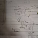 Handwritten diagram with measurements.