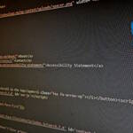 Screen capture of a coding page, with a shattered Twitter logo.