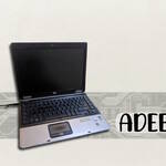 Featured image showing a dead laptop bordered by a HP-like logo with a Compaq stylised logo, denoting a dead HP Compaq product.